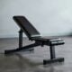 An adjustable weight bench set to an incline